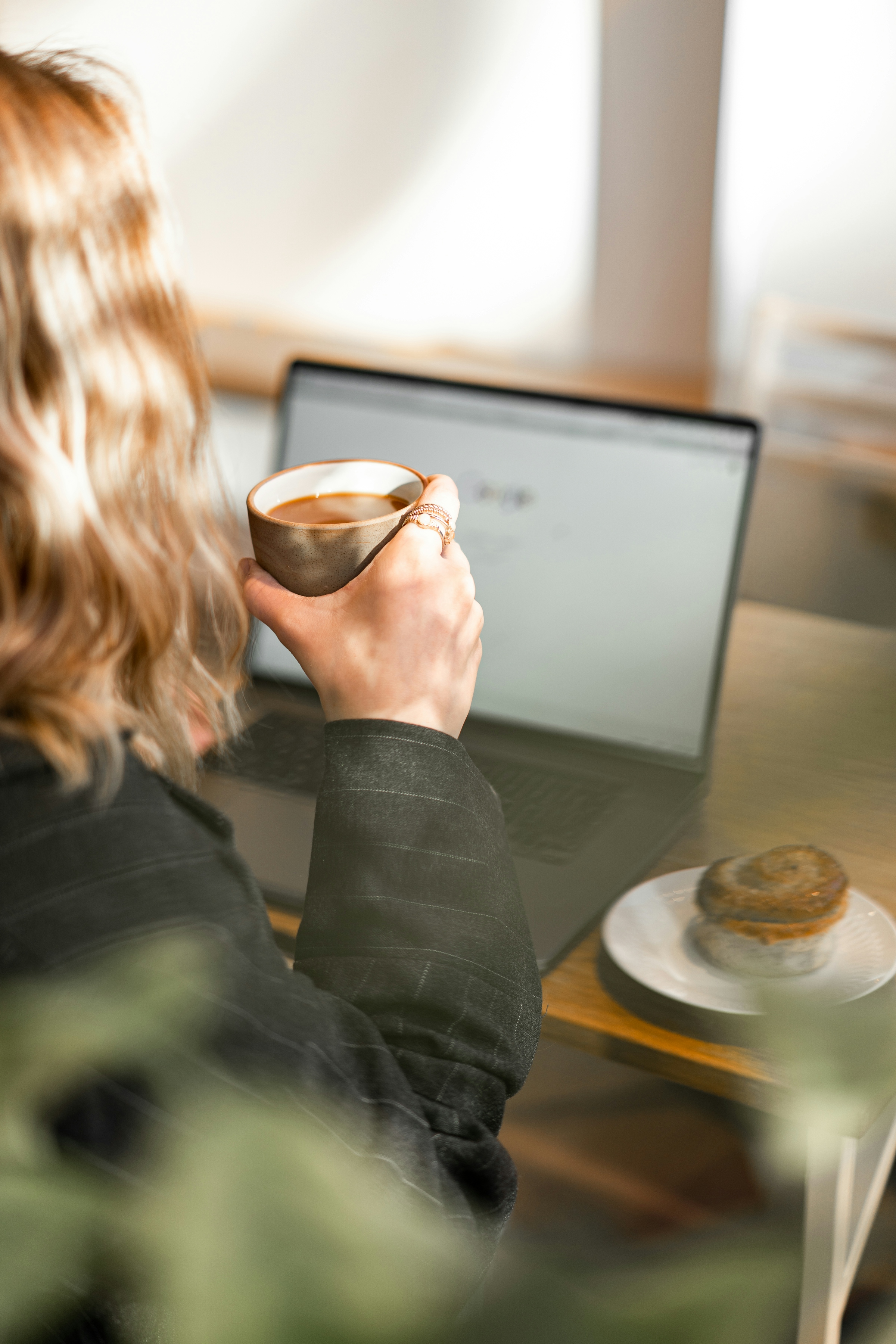 Laptop and coffee cup